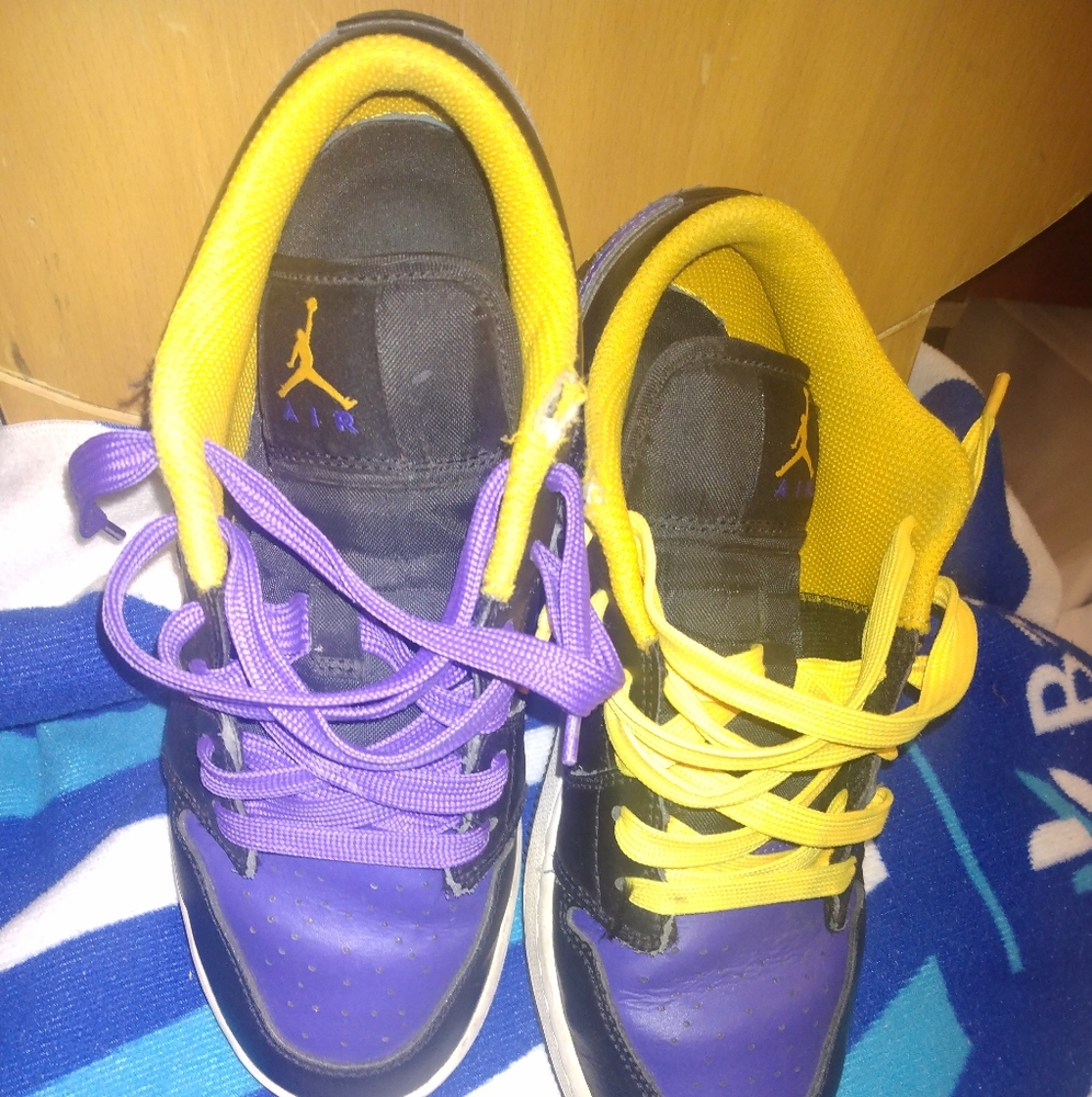 Purple and yellow Jordans